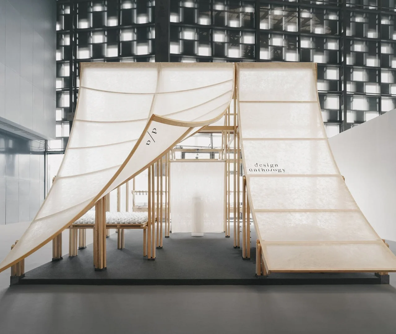 Design Anthology exhibition pavilion with paper sail canopies on a timber frame